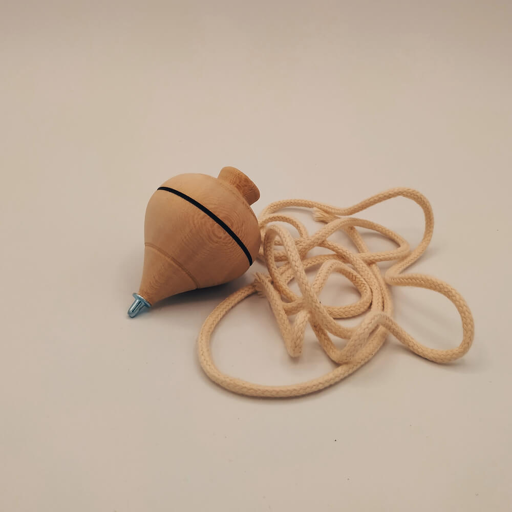 Wooden Spinning Top Naef Spin with Half Spheres